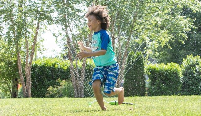 VPD Pertussis- Boy playing in sprinkler