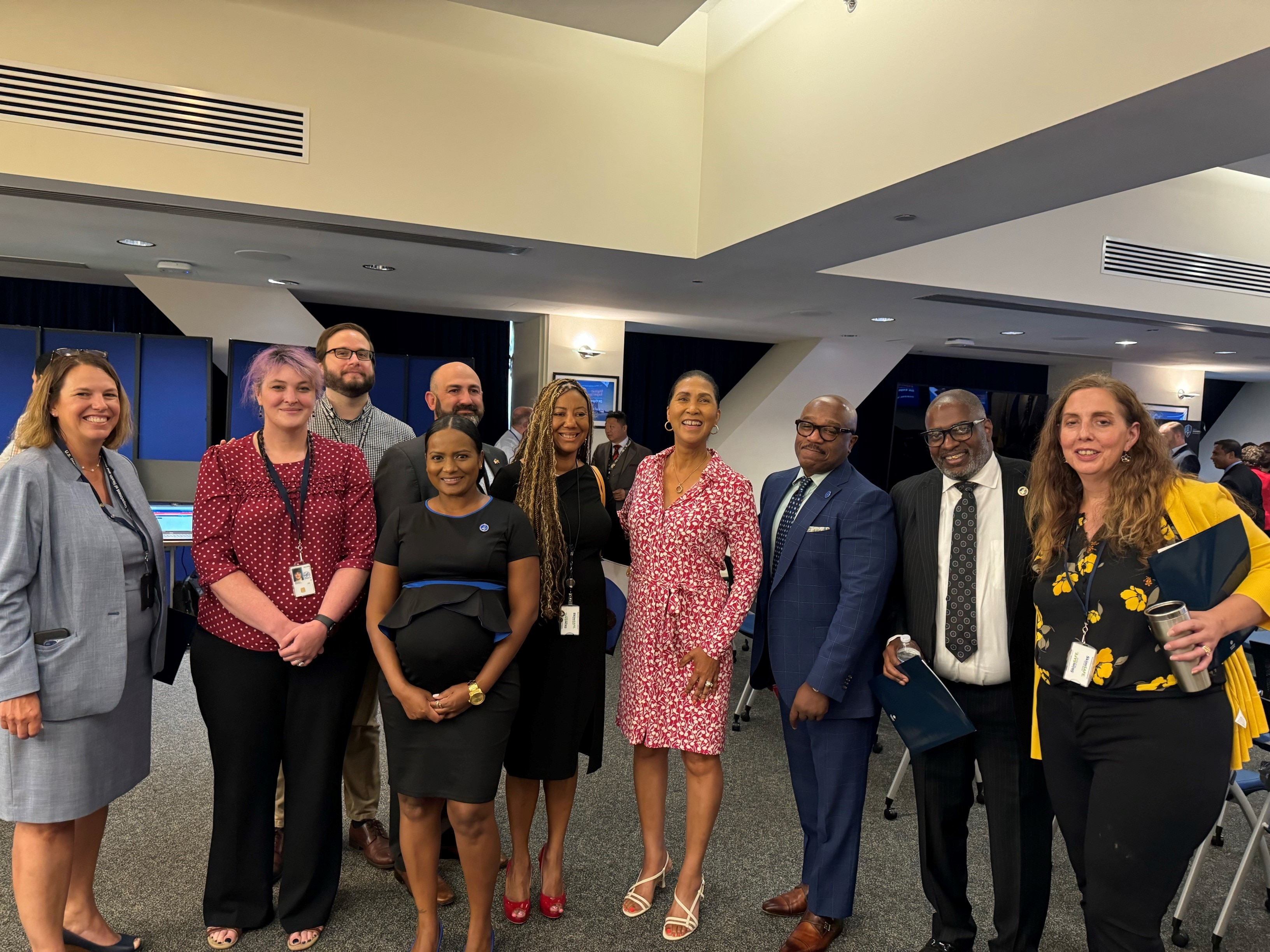 Assistant Secretary Cheryl R. Campbell, Acting Chief Information Officer Jennifer Wendel, Acting Deputy Chief Information Officer La Monte R. Yarborough, and Executive Director, Office of Operations, Avery Q. Muse, Sr. posing with other HHS staff.