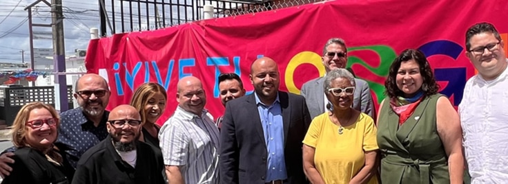 OCR Director Melanie Fontes Rainer, Chief of Staff Dennis Gonzalez, and Deputy Director of Enforcement Luis Perez, pictured with WAVES Ahead, an organization that provides advocacy and services for the LGBT+ older adults in Puerto Rico.