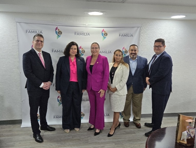 OCR Director Melanie Fontes Rainer, Chief of Staff Dennis Gonzalez, Deputy Director of Enforcement Luis Perez, Regional Manager Linda Colon, Supervisor Tony Zayas, and Puerto Rico Family Secretary Cieni Rodriguez Troche in Puerto Rico.